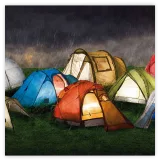 Colourful family tents pitched together on the grass