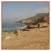 Coastal cliffs above a sandy beach